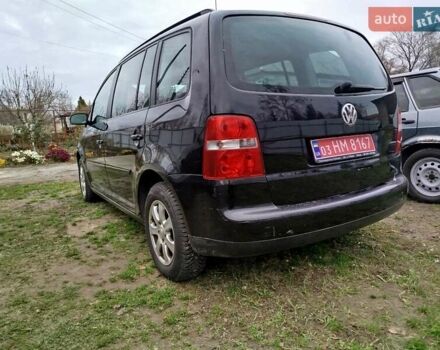 Черный Фольксваген Туран, объемом двигателя 1.6 л и пробегом 225 тыс. км за 6000 $, фото 3 на Automoto.ua