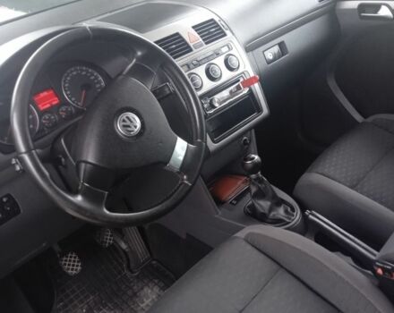 Черный Фольксваген Туран, объемом двигателя 1.4 л и пробегом 218 тыс. км за 6500 $, фото 5 на Automoto.ua