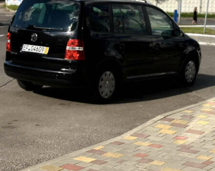 Черный Фольксваген Туран, объемом двигателя 1.6 л и пробегом 190 тыс. км за 6999 $, фото 71 на Automoto.ua