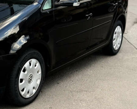 Черный Фольксваген Туран, объемом двигателя 1.6 л и пробегом 190 тыс. км за 6999 $, фото 53 на Automoto.ua