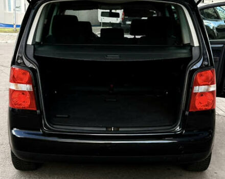 Черный Фольксваген Туран, объемом двигателя 1.6 л и пробегом 190 тыс. км за 6999 $, фото 32 на Automoto.ua