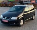 Черный Фольксваген Туран, объемом двигателя 1.6 л и пробегом 193 тыс. км за 6500 $, фото 1 на Automoto.ua