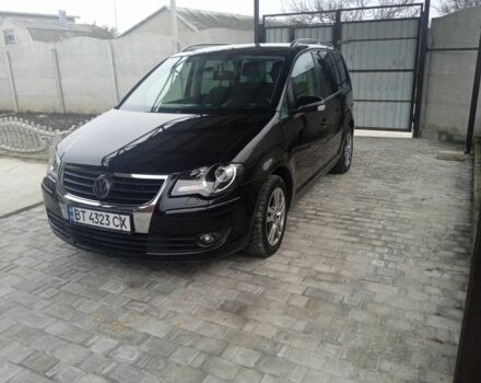 Черный Фольксваген Туран, объемом двигателя 1.4 л и пробегом 218 тыс. км за 6500 $, фото 3 на Automoto.ua