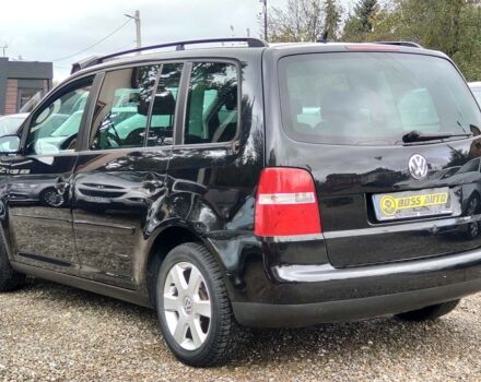 Черный Фольксваген Туран, объемом двигателя 1.6 л и пробегом 289 тыс. км за 5800 $, фото 3 на Automoto.ua