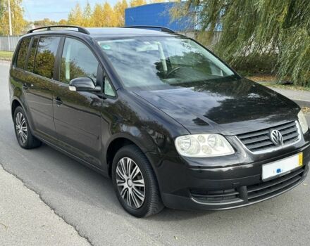 Черный Фольксваген Туран, объемом двигателя 1.9 л и пробегом 290 тыс. км за 3600 $, фото 1 на Automoto.ua