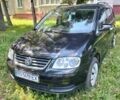 Черный Фольксваген Туран, объемом двигателя 1.6 л и пробегом 193 тыс. км за 6505 $, фото 1 на Automoto.ua