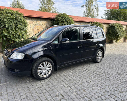 Черный Фольксваген Туран, объемом двигателя 2 л и пробегом 281 тыс. км за 5199 $, фото 2 на Automoto.ua