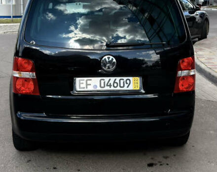 Черный Фольксваген Туран, объемом двигателя 1.6 л и пробегом 190 тыс. км за 6999 $, фото 75 на Automoto.ua