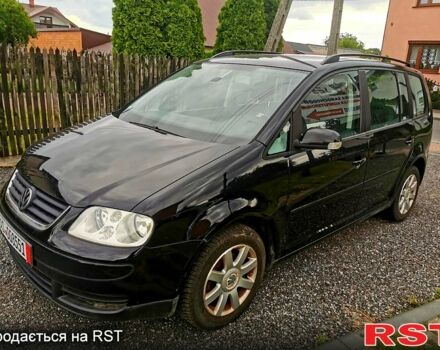 Черный Фольксваген Туран, объемом двигателя 2 л и пробегом 211 тыс. км за 2200 $, фото 1 на Automoto.ua