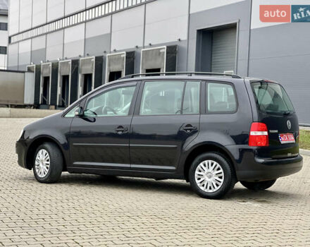 Черный Фольксваген Туран, объемом двигателя 1.6 л и пробегом 249 тыс. км за 5999 $, фото 13 на Automoto.ua