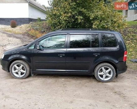 Черный Фольксваген Туран, объемом двигателя 1.6 л и пробегом 240 тыс. км за 5700 $, фото 9 на Automoto.ua