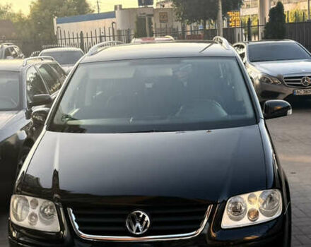 Черный Фольксваген Туран, объемом двигателя 1.6 л и пробегом 190 тыс. км за 6999 $, фото 11 на Automoto.ua