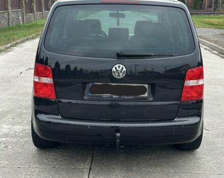 Черный Фольксваген Туран, объемом двигателя 2 л и пробегом 111 тыс. км за 4000 $, фото 4 на Automoto.ua