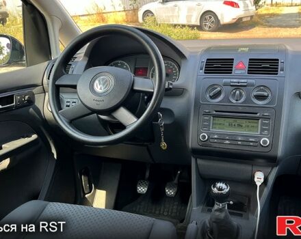 Черный Фольксваген Туран, объемом двигателя 1.4 л и пробегом 293 тыс. км за 3400 $, фото 7 на Automoto.ua
