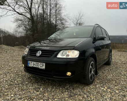 Черный Фольксваген Туран, объемом двигателя 1.9 л и пробегом 285 тыс. км за 6200 $, фото 6 на Automoto.ua