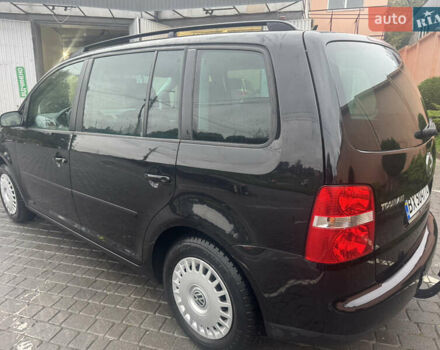 Черный Фольксваген Туран, объемом двигателя 1.9 л и пробегом 246 тыс. км за 7800 $, фото 5 на Automoto.ua