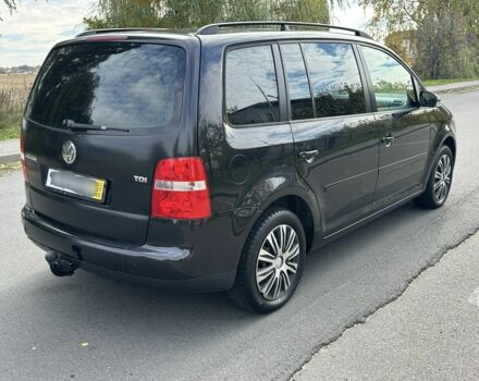 Черный Фольксваген Туран, объемом двигателя 1.9 л и пробегом 290 тыс. км за 3600 $, фото 3 на Automoto.ua