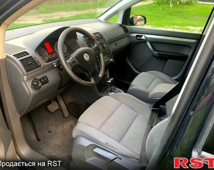 Черный Фольксваген Туран, объемом двигателя 2 л и пробегом 300 тыс. км за 4900 $, фото 8 на Automoto.ua