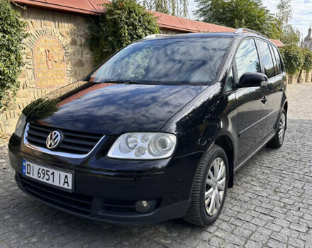 Черный Фольксваген Туран, объемом двигателя 2 л и пробегом 281 тыс. км за 5199 $, фото 1 на Automoto.ua