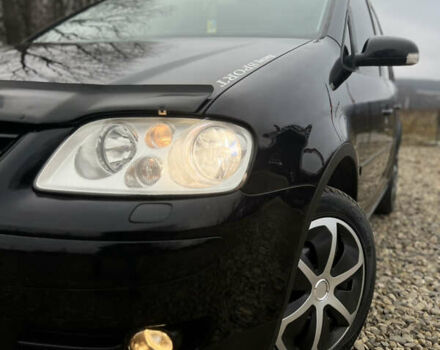 Черный Фольксваген Туран, объемом двигателя 1.9 л и пробегом 285 тыс. км за 6200 $, фото 1 на Automoto.ua