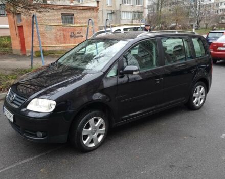 Черный Фольксваген Туран, объемом двигателя 1.4 л и пробегом 239 тыс. км за 5700 $, фото 3 на Automoto.ua