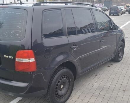 Черный Фольксваген Туран, объемом двигателя 2 л и пробегом 485 тыс. км за 4550 $, фото 1 на Automoto.ua