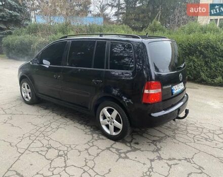 Чорний Фольксваген Туран, об'ємом двигуна 1.9 л та пробігом 390 тис. км за 6500 $, фото 3 на Automoto.ua