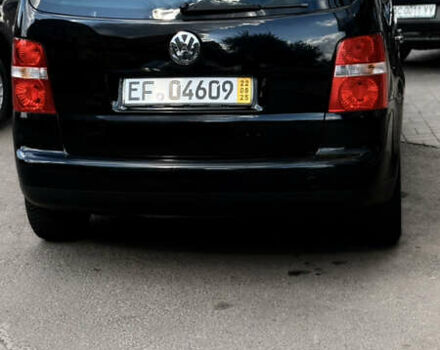 Черный Фольксваген Туран, объемом двигателя 1.6 л и пробегом 190 тыс. км за 6999 $, фото 59 на Automoto.ua