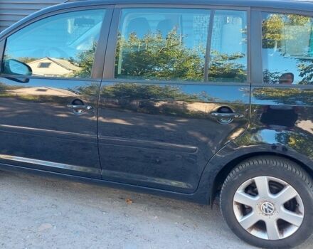 Черный Фольксваген Туран, объемом двигателя 1.6 л и пробегом 238 тыс. км за 5900 $, фото 4 на Automoto.ua