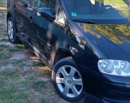 Черный Фольксваген Туран, объемом двигателя 1.6 л и пробегом 238 тыс. км за 5900 $, фото 3 на Automoto.ua