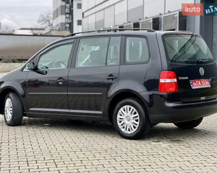 Черный Фольксваген Туран, объемом двигателя 1.6 л и пробегом 249 тыс. км за 5999 $, фото 14 на Automoto.ua