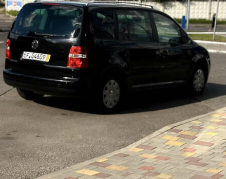 Черный Фольксваген Туран, объемом двигателя 1.6 л и пробегом 190 тыс. км за 6999 $, фото 67 на Automoto.ua