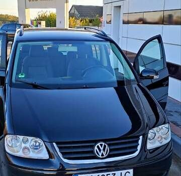 Черный Фольксваген Туран, объемом двигателя 1.6 л и пробегом 197 тыс. км за 5850 $, фото 12 на Automoto.ua