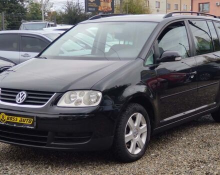 Черный Фольксваген Туран, объемом двигателя 1.6 л и пробегом 289 тыс. км за 5800 $, фото 2 на Automoto.ua