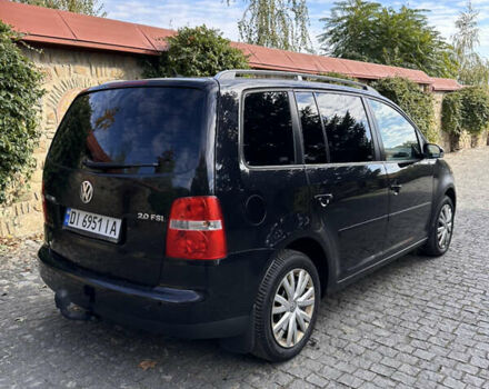 Черный Фольксваген Туран, объемом двигателя 2 л и пробегом 281 тыс. км за 5199 $, фото 5 на Automoto.ua