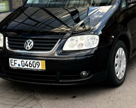 Черный Фольксваген Туран, объемом двигателя 1.6 л и пробегом 190 тыс. км за 6999 $, фото 50 на Automoto.ua