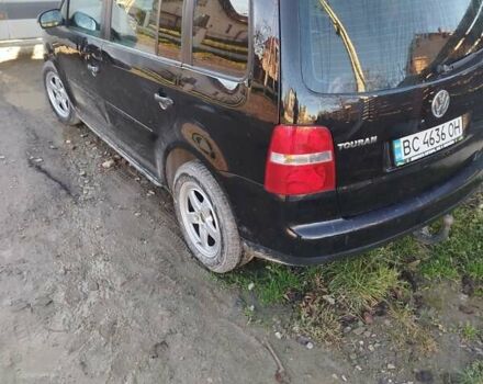 Чорний Фольксваген Туран, об'ємом двигуна 1.9 л та пробігом 327 тис. км за 5800 $, фото 4 на Automoto.ua
