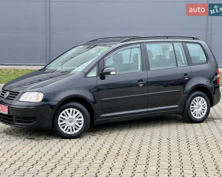 Черный Фольксваген Туран, объемом двигателя 1.6 л и пробегом 249 тыс. км за 5999 $, фото 9 на Automoto.ua