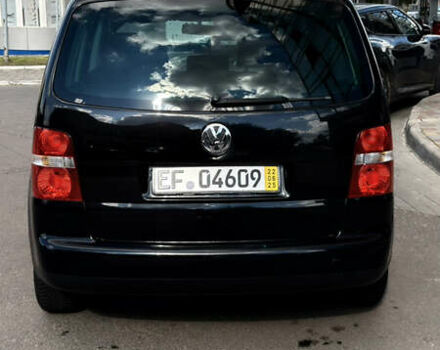Черный Фольксваген Туран, объемом двигателя 1.6 л и пробегом 190 тыс. км за 6999 $, фото 77 на Automoto.ua
