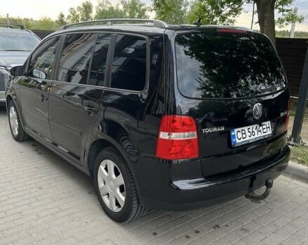 Черный Фольксваген Туран, объемом двигателя 1.97 л и пробегом 292 тыс. км за 6500 $, фото 3 на Automoto.ua