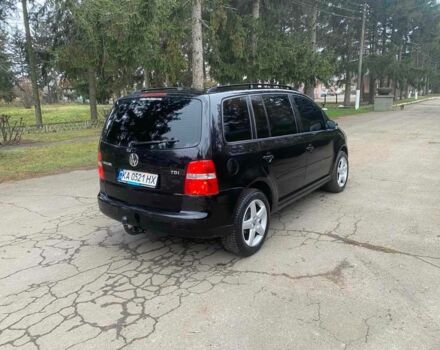 Чорний Фольксваген Туран, об'ємом двигуна 1.9 л та пробігом 290 тис. км за 6500 $, фото 4 на Automoto.ua