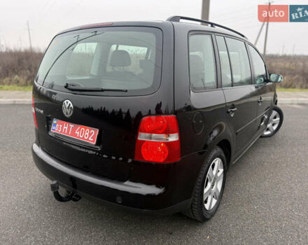 Чорний Фольксваген Туран, об'ємом двигуна 1.6 л та пробігом 220 тис. км за 6200 $, фото 11 на Automoto.ua