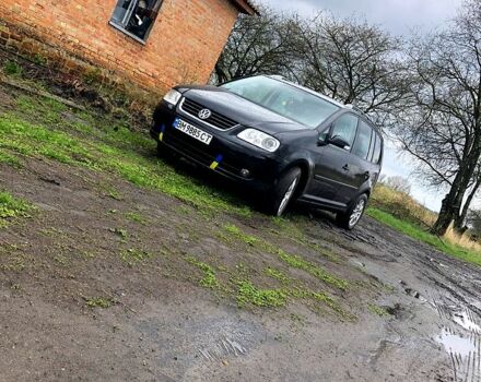 Черный Фольксваген Туран, объемом двигателя 2 л и пробегом 220 тыс. км за 7500 $, фото 2 на Automoto.ua