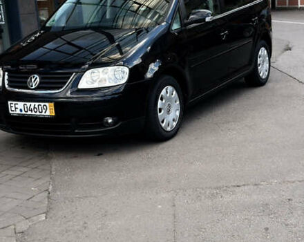 Черный Фольксваген Туран, объемом двигателя 1.6 л и пробегом 190 тыс. км за 6999 $, фото 48 на Automoto.ua