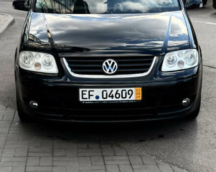 Черный Фольксваген Туран, объемом двигателя 1.6 л и пробегом 190 тыс. км за 6999 $, фото 65 на Automoto.ua