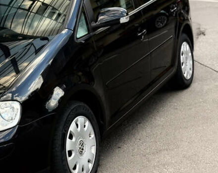 Черный Фольксваген Туран, объемом двигателя 1.6 л и пробегом 190 тыс. км за 6999 $, фото 49 на Automoto.ua