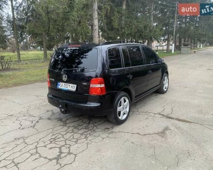 Чорний Фольксваген Туран, об'ємом двигуна 1.9 л та пробігом 390 тис. км за 6500 $, фото 4 на Automoto.ua