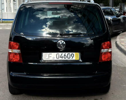 Черный Фольксваген Туран, объемом двигателя 1.6 л и пробегом 190 тыс. км за 6999 $, фото 66 на Automoto.ua