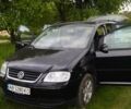 Черный Фольксваген Туран, объемом двигателя 1.6 л и пробегом 225 тыс. км за 6500 $, фото 1 на Automoto.ua