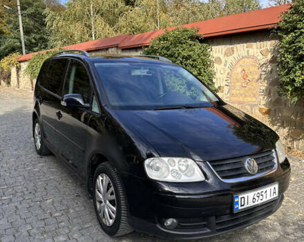 Черный Фольксваген Туран, объемом двигателя 2 л и пробегом 281 тыс. км за 5199 $, фото 4 на Automoto.ua